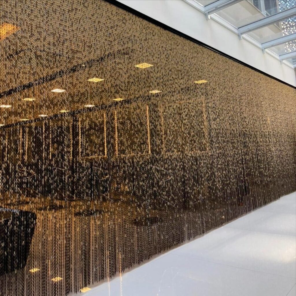 Loja com divisória de correntes Dropiron